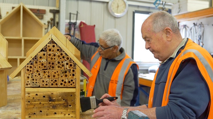 Gentlemen making beehives