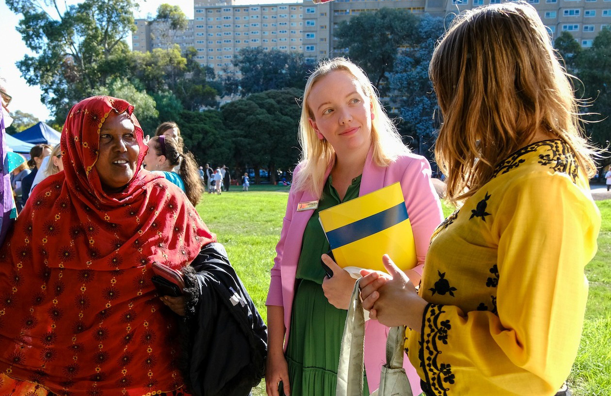 Three ladies in a park talking